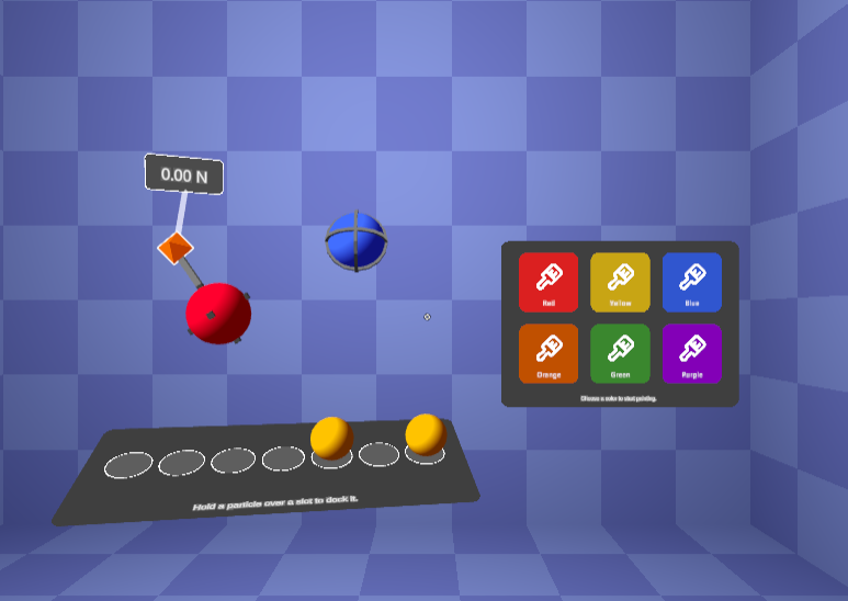 lab setup with two painted particles and a force meter reading zero force (1/2)